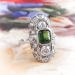 Edwardian C.D. Peacock Green Tourmaline Old European Cut Diamond Navette Ring Platinum